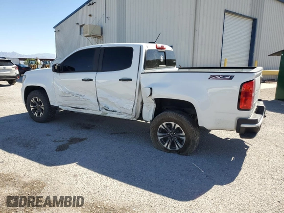 2021 Chevrolet Colorado 2WD Z71 with VIN 1GCGSDEN7M1201219, listed as a Copart auction lot 61310215 with 184,819 mi miles and Salvage title. Bid and sale history available at DreamBid. Image 2.