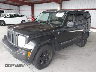 2011 Jeep Liberty Sport with VIN 1J4PN2GK8BW557672, listed as a IAAI auction lot 42260398 with 148,288 mi miles and . Bid and sale history available at DreamBid. Image 2.