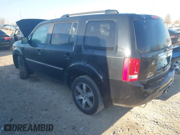 2013 Honda Pilot Touring with VIN 5FNYF4H96DB006582, listed as a IAAI auction lot 41722386 with 220,354 mi miles and . Bid and sale history available at carsss.com. Image 3.