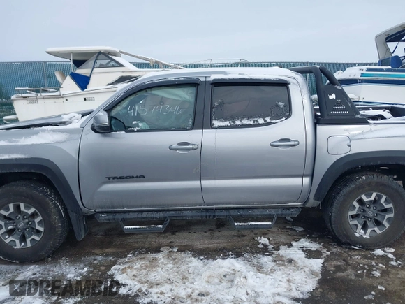 2019 Toyota Tacoma SR z VIN 3TMCZ5AN8KM211246, wystawiony jako IAAI lot #41574346 z przebiegiem 66 825 mil mil oraz . Historia ofert i sprzedaży dostępna na DreamBid. Obrazek 15.