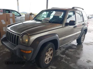 2003 Jeep Liberty Sport with VIN 1J4GK48K13W633818, listed as a IAAI auction lot 41962552 with 217,884 mi miles and . Bid and sale history available at DreamBid. Image 6.