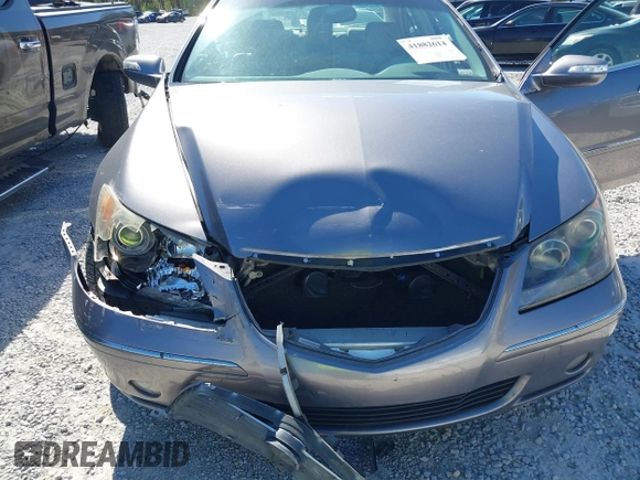 2007 Acura RL Tech Pkg with VIN JH4KB16647C002703, listed as a IAAI auction lot 41882614 with 174,713 mi miles. Bid and sale history available at carsss.com. Image 6.