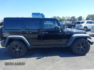 2008 Jeep Wrangler Unlimited Rubicon with VIN 1J8GA69108L574773, listed as a IAAI auction lot 42714300 with 106,974 mi miles and . Bid and sale history available at DreamBid. Image 13.