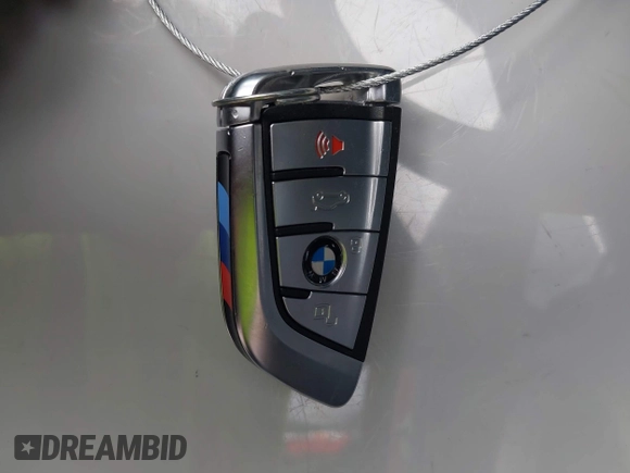 2022 BMW 8 Series M850i z VIN WBAGV8C04NCH90015, wystawiony jako IAAI lot #42020711 z przebiegiem 39 801 mil mil oraz . Historia ofert i sprzedaży dostępna na DreamBid. Obrazek 11.