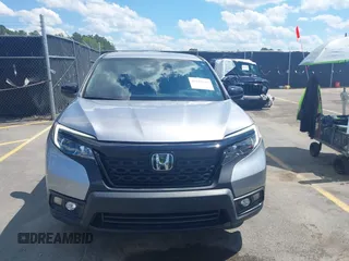2021 Honda Passport Sport with VIN 5FNYF7H27MB003467, listed as a IAAI auction lot 42183219 with 52,156 mi miles and . Bid and sale history available at DreamBid. Image 12.