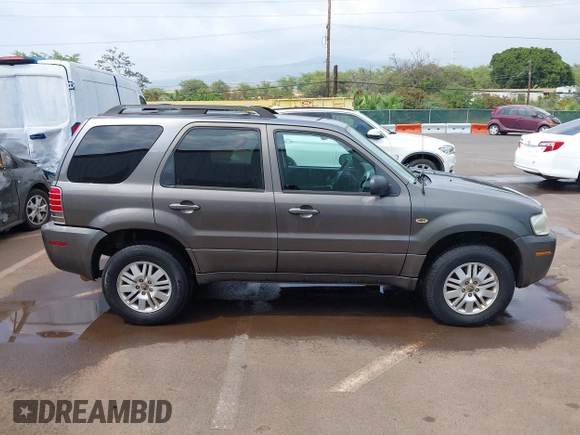 2006 Mercury Mariner Luxury with VIN 4M2YU57166KJ17723, listed as a IAAI auction lot 41818695 with 136,881 mi miles and . Bid and sale history available at DreamBid. Image 13.