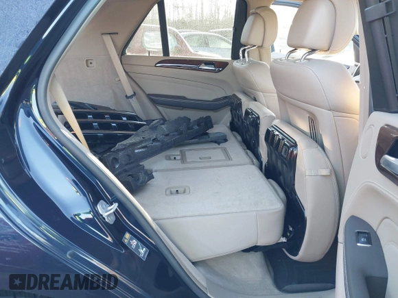 2015 Mercedes-Benz M 400 with VIN 4JGDA5GB3FA469911, listed as a IAAI auction lot 41411088 with 77,308 mi miles and . Bid and sale history available at DreamBid. Image 8.