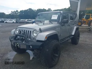 2016 Jeep Wrangler Unlimited Sahara with VIN 1C4BJWEG5GL117872, listed as a IAAI auction lot 42692798 with 119,819 mi miles and . Bid and sale history available at DreamBid. Image 2.