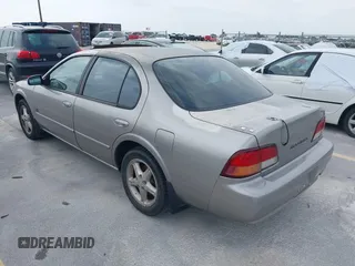 1999 Nissan Maxima GXE with VIN JN1CA21D6XT223369, listed as a IAAI auction lot 42141361 with 210,781 mi miles and . Bid and sale history available at DreamBid. Image 3.