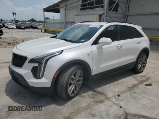 2020 Cadillac XT4 FWD Sport with VIN 1GYFZER49LF123830, listed as a Copart auction lot 55737985 with 98,871 mi miles and Salvage title. Bid and sale history available at DreamBid. Image 1.