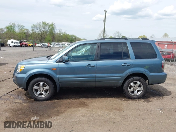 2007 Honda Pilot EX with VIN 5FNYF18447B008645, listed as a IAAI auction lot 42079535 with 233,187 mi miles. Bid and sale history available at carsss.com. Image 14.
