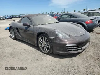 2014 Porsche Boxster z VIN WP0CA2A83ES120462, wystawiony jako Copart lot #74617404 z przebiegiem 23 055 mil mil oraz Nie do naprawy • Non repairable. Historia ofert i sprzedaży dostępna na DreamBid. Obrazek 4.