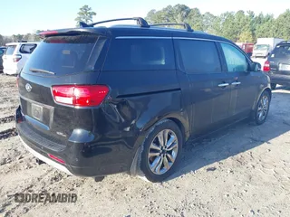 2015 Kia Sedona SX-L with VIN KNDME5C16F6037693, listed as a IAAI auction lot 41779327 with 149,552 mi miles and . Bid and sale history available at DreamBid. Image 4.
