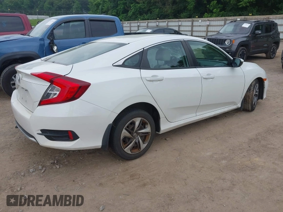 2020 Honda Civic LX z VIN 19XFC2F66LE021813, wystawiony jako IAAI lot #42285033 z przebiegiem 116 069 mil mil oraz . Historia ofert i sprzedaży dostępna na DreamBid. Obrazek 4.