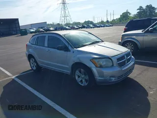 2011 Dodge Caliber Mainstreet with VIN 1B3CB3HA2BD117839, listed as a IAAI auction lot 42101103 with 142,099 mi miles. Bid and sale history available at carsss.com. Image 1.