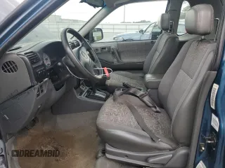 2001 Isuzu Rodeo with VIN 4S2CM57WX14307912, listed as a Copart auction lot 72416784 with 170,522 mi miles and Salvage title. Bid and sale history available at DreamBid. Image 7.