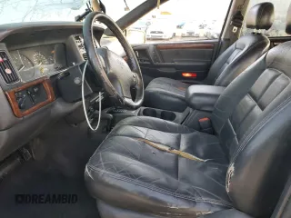 1998 Jeep Grand Cherokee Limited с VIN 1J4GZ78Y0WC260231, выставлен на аукционе Copart как лот 85149724 с пробегом 203 258 миль миль и Списание • Salvage title. История ставок и продаж доступна на DreamBid. Изображение 7.