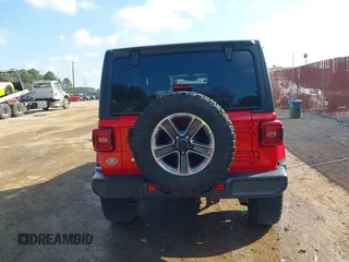 2018 Jeep Wrangler Unlimited Sahara z VIN 1C4HJXEN7JW224927, wystawiony jako IAAI lot #41515557 z przebiegiem 81 138 mil mil oraz . Historia ofert i sprzedaży dostępna na DreamBid. Obrazek 17.