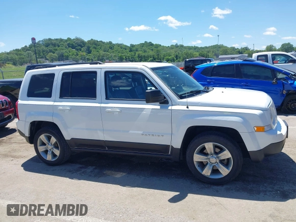 2014 Jeep Patriot Latitude z VIN 1C4NJPFB1ED505288, wystawiony jako IAAI lot #42118356 z przebiegiem 146 615 mil mil oraz . Historia ofert i sprzedaży dostępna na DreamBid. Obrazek 14.