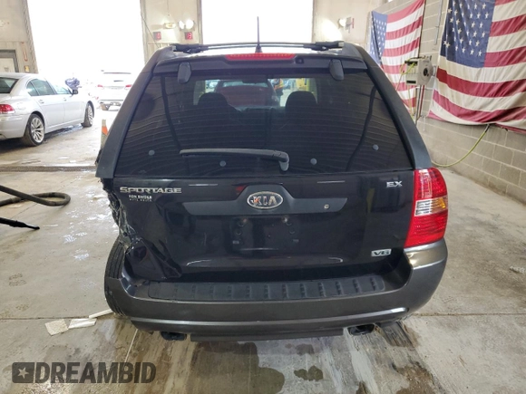 2005 Kia Sportage LX with VIN KNDJE723X57131795, listed as a Copart auction lot 79035214 with 146,746 mi miles and Salvage Title. Bid and sale history available at carsss.com. Image 6.