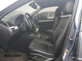 2005 BMW 3 Series 325xi with VIN WBAEU33455PF63005, listed as a Copart auction lot 60960985 with 188,733 mi miles and Salvage title. Bid and sale history available at DreamBid. Image 7.