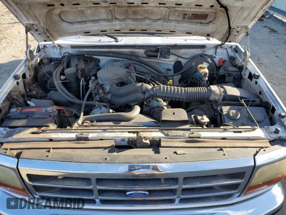 1994 Ford Bronco XL с VIN 1FMEU15N0RLA76670, выставлен на аукционе Copart как лот 46048315 с пробегом 269 968 миль миль и Списание • Salvage title. История ставок и продаж доступна на DreamBid. Изображение 12.