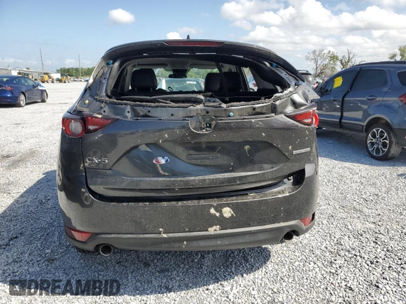 2020 Mazda CX-5 Touring with VIN JM3KFACM7L0766928, listed as a Copart auction lot 52494305 with Not Provided miles and Non Repairable. Bid and sale history available at DreamBid. Image 6.