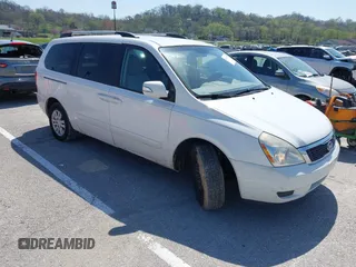 2011 Kia Sedona LX with VIN KNDMG4C79B6409885, listed as a IAAI auction lot 41971702 with 374,233 mi miles. Bid and sale history available at carsss.com. Image 1.