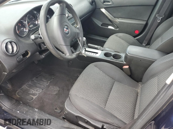 2009 Pontiac G6 w/1SA *Ltd Avail* with VIN 1G2ZG57B094133844, listed as a Copart auction lot 70451604 with 165,466 mi miles and Salvage Title. Bid and sale history available at carsss.com. Image 7.