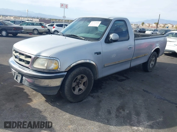 1997 Ford F-150 with VIN 1FTEF17W3VLA19510, listed as a IAAI auction lot 41711010 with 214,984 mi miles and . Bid and sale history available at DreamBid. Image 2.
