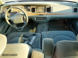 1996 Ford Crown Victoria LX with VIN 2FALP74W5TX146843, listed as a Copart auction lot 77251964 with 74,559 mi miles and Clean Title. Bid and sale history available at carsss.com. Image 8.