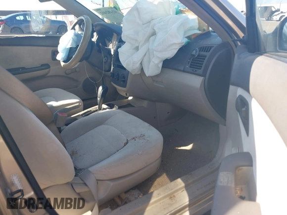 2004 Kia Spectra LX with VIN KNAFE121745039519, listed as a IAAI auction lot 41482402 with 201,123 mi miles. Bid and sale history available at carsss.com. Image 5.
