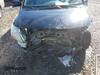 2007 Toyota Yaris with VIN JTDBT923971098915, listed as a IAAI auction lot 41577424 with 234,959 mi miles. Bid and sale history available at carsss.com. Image 6.