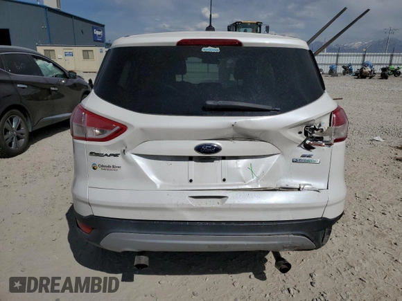 2015 Ford Escape SE with VIN 1FMCU0GX9FUC26779, listed as a Copart auction lot 52772325 with 135,121 mi miles and Salvage Title. Bid and sale history available at DreamBid. Image 6.