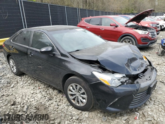 2017 Toyota Camry XLE z VIN 4T1BF1FK3HU379016, wystawiony jako Copart lot #52704015 z przebiegiem 167 129 mil mil oraz Szkoda całkowita • Salvage title. Historia ofert i sprzedaży dostępna na DreamBid. Obrazek 4.
