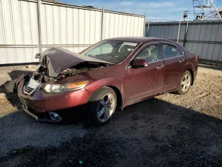 2012 Acura TSX with VIN JH4CU2F42CC006911, listed as a Copart auction lot 83497074 with 99,770 mi miles and Salvage Title. Bid and sale history available at carsss.com. Image 1.