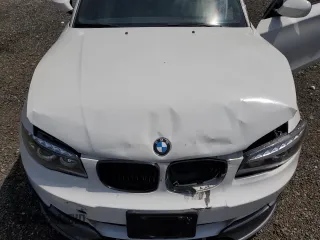 2010 BMW 1 Series 128i with VIN WBAUN1C50AVH81851, listed as a Copart auction lot 56607275 with 145,036 mi miles and Salvage title. Bid and sale history available at DreamBid. Image 11.