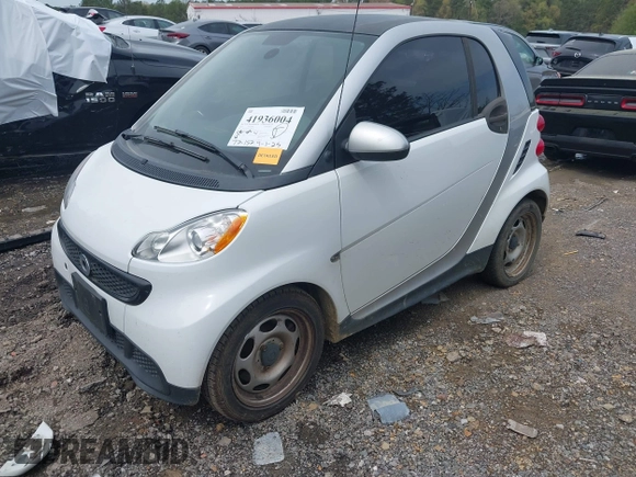 2015 Smart fortwo Passion with VIN WMEEJ3BA9FK801907, listed as a IAAI auction lot 41936004 with 72,152 mi miles and . Bid and sale history available at DreamBid. Image 2.