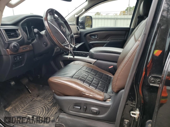 2017 Nissan Titan XD SL with VIN 1N6AA1F41HN548361, listed as a Copart auction lot 84654174 with 142,057 mi miles and Salvage Title. Bid and sale history available at carsss.com. Image 7.