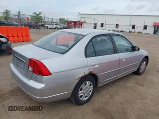 2003 Honda Civic LX with VIN 2HGES16533H571332, listed as a IAAI auction lot 42153221 with 202,926 mi miles. Bid and sale history available at carsss.com. Image 4.