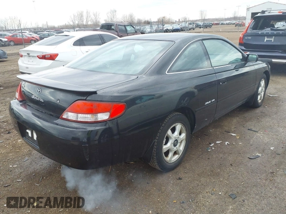 1999 Toyota Solara SE with VIN 2T1CF22P2XC252320, listed as a IAAI auction lot 41676843 with 156,431 mi miles. Bid and sale history available at carsss.com. Image 4.