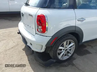 2013 MINI Countryman S with VIN WMWZC3C55DWP24628, listed as a IAAI auction lot 42558387 with 169,269 mi miles and . Bid and sale history available at DreamBid. Image 6.