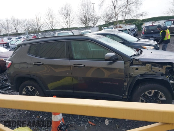 2017 Jeep Compass Trailhawk with VIN 3C4NJDDB9HT657173, listed as a IAAI auction lot 41613348 with 60,781 mi miles and . Bid and sale history available at DreamBid. Image 14.