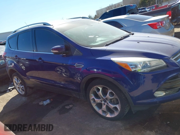 2016 Ford Escape Titanium with VIN 1FMCU0J95GUC41632, listed as a IAAI auction lot 41692040 with 144,834 mi miles. Bid and sale history available at carsss.com. Image 13.