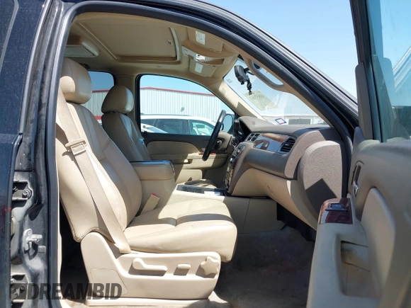 2012 Chevrolet Tahoe LT with VIN 1GNSCBE07CR229240, listed as a IAAI auction lot 41837063 with 219,901 mi miles and . Bid and sale history available at DreamBid. Image 5.