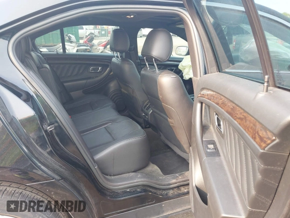 2014 Ford Taurus Limited with VIN 1FAHP2F88EG171235, listed as a IAAI auction lot 42402720 with 79,951 mi miles and . Bid and sale history available at DreamBid. Image 8.