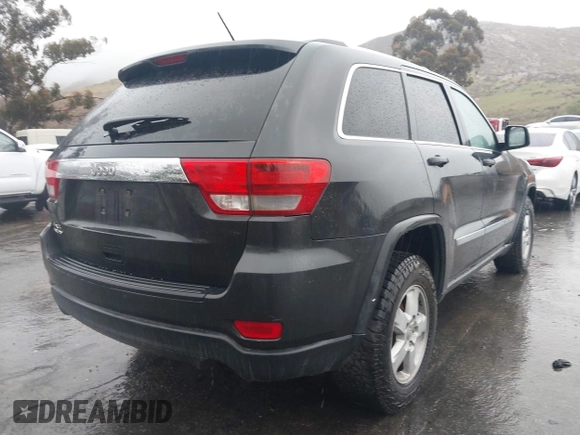2011 Jeep Grand Cherokee Laredo z VIN 1J4RR4GG1BC566381, wystawiony jako IAAI lot #41547199 z przebiegiem 215 157 mil mil oraz . Historia ofert i sprzedaży dostępna na DreamBid. Obrazek 4.