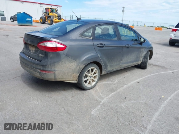 2017 Ford Fiesta SE z VIN 3FADP4BJ2HM134825, wystawiony jako IAAI lot #42331095 z przebiegiem 117 794 mil mil oraz . Historia ofert i sprzedaży dostępna na DreamBid. Obrazek 4.