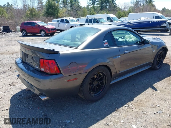 2004 Ford Mustang GT Deluxe with VIN 1FAFP42X44F142786, listed as a IAAI auction lot 42095619 with 100,020 mi miles and . Bid and sale history available at DreamBid. Image 4.