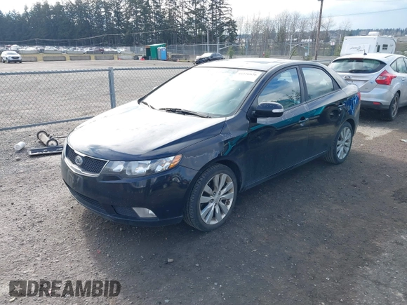 2010 Kia Forte SX with VIN KNAFW4A39A5054469, listed as a IAAI auction lot 41526636 with 115,008 mi miles. Bid and sale history available at carsss.com. Image 2.